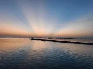 Obraz premium sunset over the river