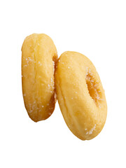 Side view of two brown sugar glazed cinnamon donuts in stack isolated on white background with clipping path