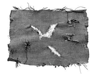 Piece of black torn denim on a white background. Denim texture