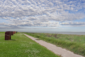 Footpath along rest area in Wattenmeer National Park,North Sea,Dornumersiel,East Frisia,lower...