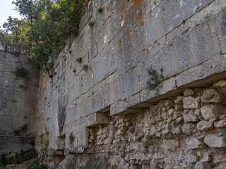 Termessos is an ancient city located in Turkey high in the mountains. The walls of the buildings in...