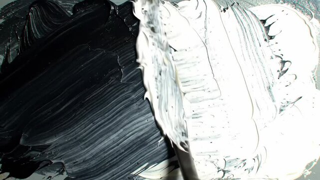 Abstract impasto painting animates with palette knife motion and shifting paint textures