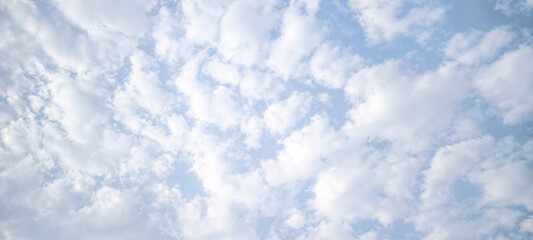 Background with clouds on blue sky. Sky view. Beautiful sunny sky.