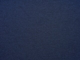 Enveloped in midnight blue, the paper's texture captures the mystique of twilight under a starless...