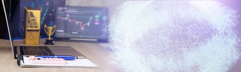 Laptop with gold bar, trophy, and financial charts, overlaid with a digital globe network,...