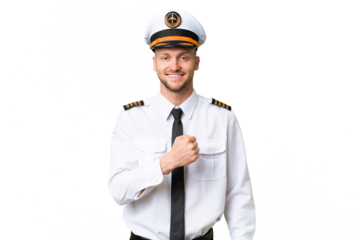 Airplane pilot man over isolated background celebrating a victory