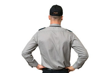 Young security caucasian man over isolated background in back position