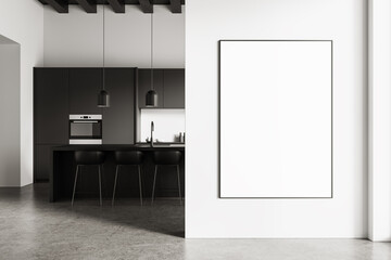 Blank poster mockup on white wall in modern kitchen interior with dark cabinets and island lighting...
