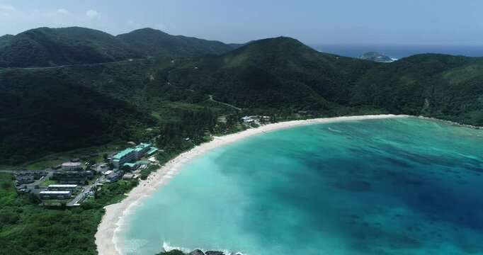 Aerial View of Tokashiku Beach's White Sand and Curve