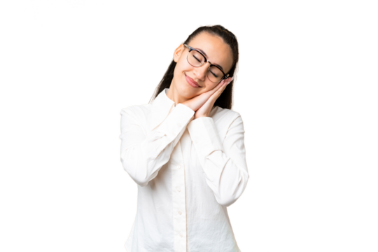 Young Arabian woman over isolated chroma key background making sleep gesture in dorable expression