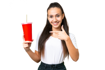 Young Arabian woman holding soda over isolated chroma key background and pointing it