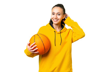 Young Arabian woman playing basketball over isolated wall  over isolated chroma key background...