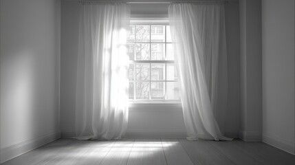 An empty room with a window illuminated from behind and adorned with white curtains.