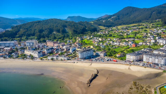Aerial view of covas beach embracing the charming town of viveiro in galicia