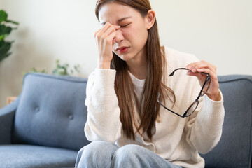 Eye problem concept, fatigue asian young woman tired eyes, irritated rubbing eye dry relief vision...
