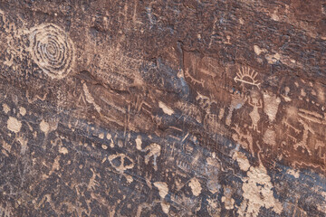 Newspaper Rock Petroglyphs Archeological District, Petrified Forest National Park, Arizona. Desert varnish. Chinle Formation, Blue Mesa Member. Mudstone with minor siltstone and sandstone.