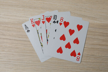 poker card on wooden background
