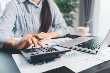 Business woman analyze calculate company financial, tax results office accounting statistics...