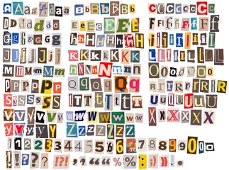 Fotobehang Collage of cut-out letters, numbers, and symbols on white. © adimas