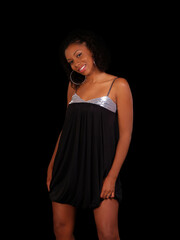 Fototapeta premium Pretty African American Woman In Black Dress Smiling