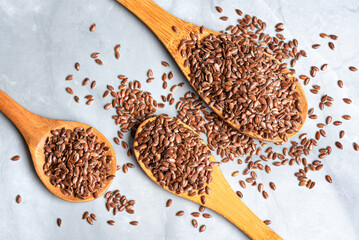 Lin seeds or flax seeds on spoons