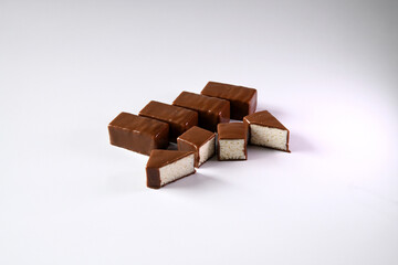 Chocolate candies with souffle on a white background. High quality photo