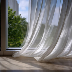 Sheer white curtain blowing gently in wind by window, green tree and blue sky background, natural light, airy indoor scene