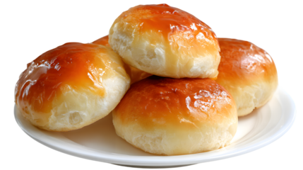 Freshly Baked Sweet Buns with Glossy Glaze on a White Plate