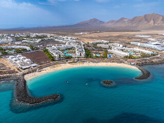 Playa Dorada beach in Playa Blanca from drone, Lanzarote