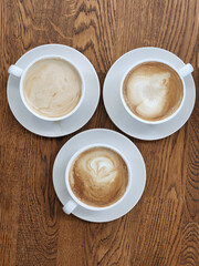 Three cups of coffee. Hot coffee in three cups