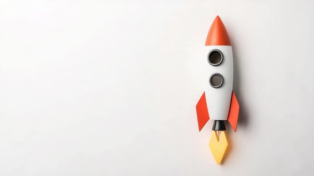 Vibrant toy rocket with red and yellow accents is depicted mid flight against a clean white backdrop, symbolizing the exciting journey of learning and personal development