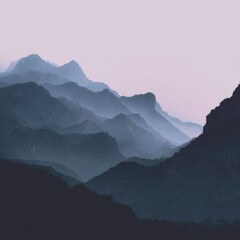 Fototapeta premium Serene Mountain Landscape at Dusk with Soft Pink Sky and Peaks