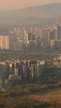 Barve Nagar, Ghatkopar West, Mumbai, Maharashtra, India. Mumbai Metropolitan Region. Aerial View From Airplane Window On View of the Mumbai suburb district. Evening morning sunset sunrise light