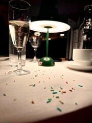 Champagne and Ambient Lighting on Decorated Restaurant Table