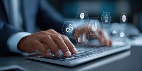 Business person using a computer, overlaid with data visualization graphics