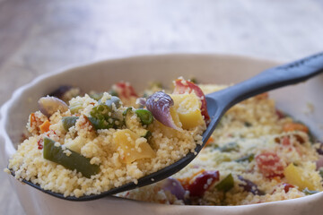 couscous scooped with fresh summer vegetables