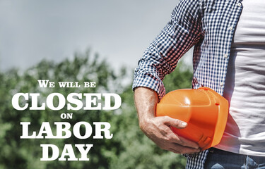 Signboard with the inscription We will be closed on Labor Day. Congratulations for family, loved ones, friends and colleagues. Holiday preparation concept