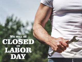 Signboard with the inscription We will be closed on Labor Day. Congratulations for family, loved ones, friends and colleagues. Holiday preparation concept