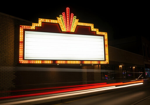 Retro marquee sign with lights, featuring a large blank space for custom messages, framed by a red and gold border, set against a dark brick wall at night.