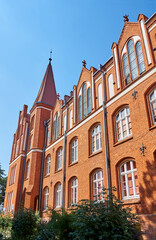 Historic, neo-Gothic, red-brick building in Drezdenko