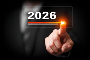Business hand touches 2026 on a projected screen
