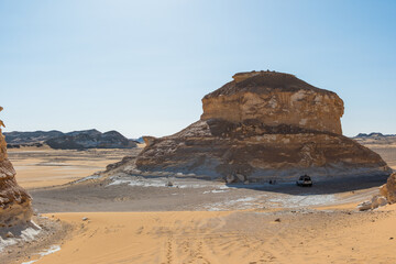 White rock formations and sand dunes in Egypt's White Desert, natural desert landscape	