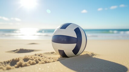 Obraz premium A classic volleyball rests on the golden sand of a sunny beach. The bright sun sparkles on the blue ocean waves, creating the perfect summer vacation scene for a fun game or pur