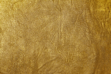 Beautiful golden background with leather texture
