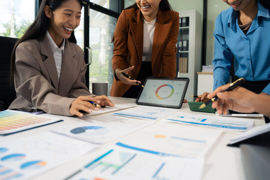 Close up Businessman and partner using calculator and laptop for calculation finance, tax, accounting, statistics and analytic research concept. in the office.