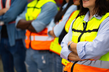 arm crossed Unity and teamwork. Engineering and civil factory team standing. Portrait engineer factory manager worker and mechanic team together at metal sheet profiling factory. Industrial production