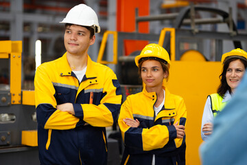 arm crossed Unity and teamwork. Engineering and civil factory team standing. Portrait engineer...