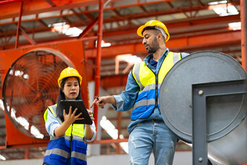 Unity and teamwork concept. Two professional engineer worker working control sheet metal roof tile...