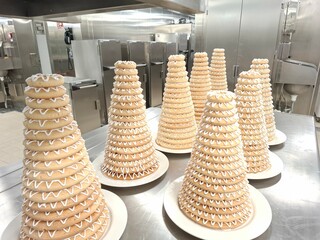 Traditional Tiered Nordic Cakes on Display in a Professional Kitchen Setting