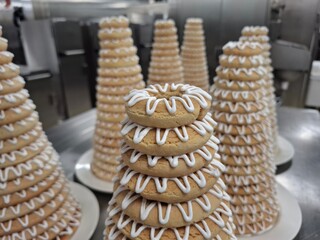 Traditional Tiered Nordic Cakes on Display in a Professional Kitchen Setting